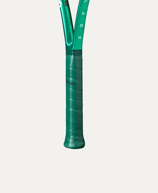 Green tennis racket with Wilson logo on a white background