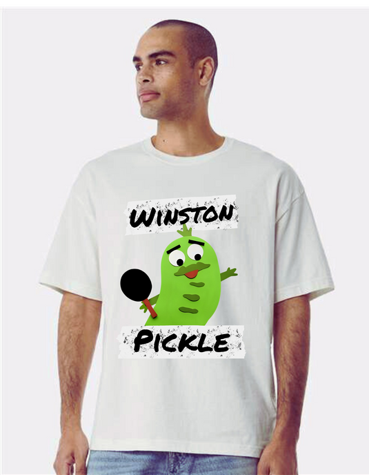 Person wearing a white t-shirt with a cartoon pickle design and text.