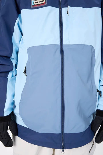 Load image into Gallery viewer, Light blue and navy jacket with a visible Airblaster brand logo. Ski and Tennis Station
