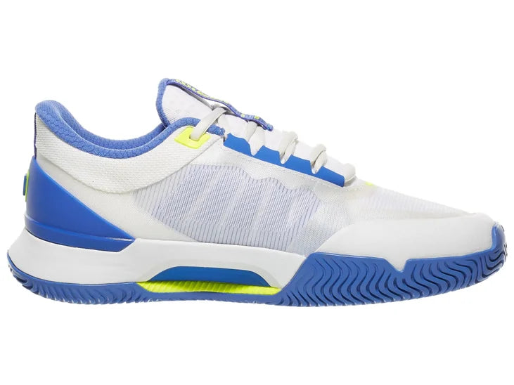 Load image into Gallery viewer, White and blue athletic shoe with green accents on a white background
