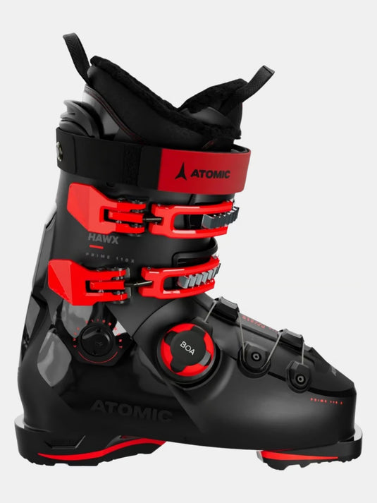 A black and red Atomic Hawk 1110x ski boot with a BOA dial system, shown from a side profile on a light gray background. Ski and Tennis Station