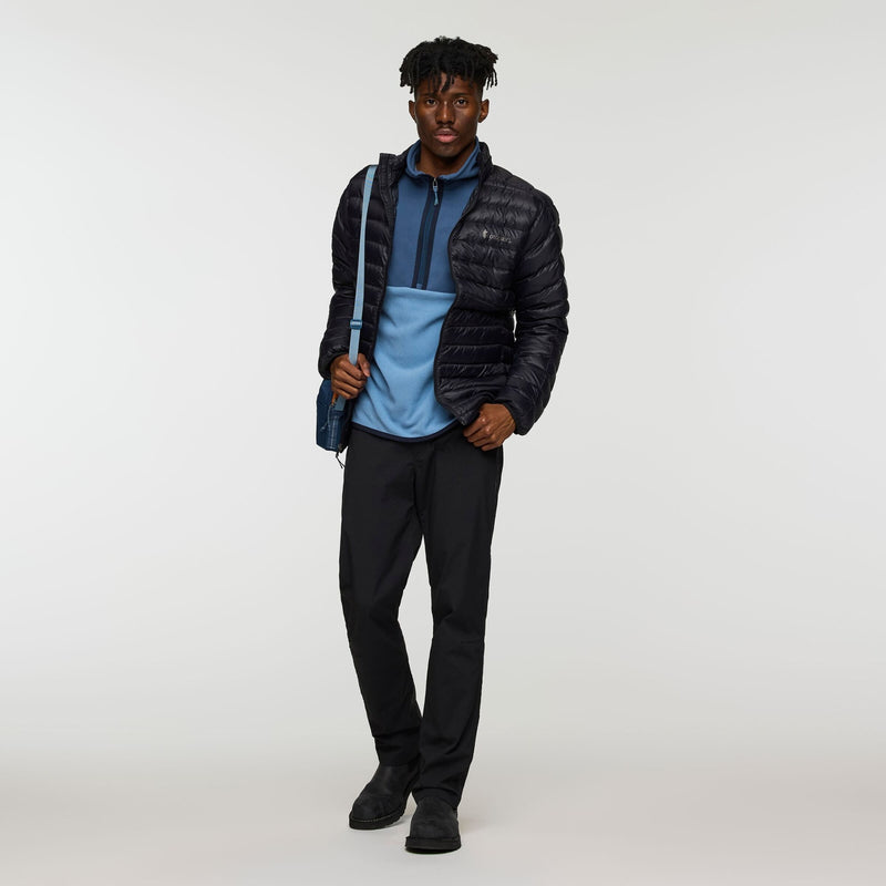 Load image into Gallery viewer, Man wearing a black puffer jacket, blue shirt, and black pants on a white background
