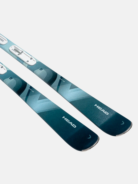 Two blue and white skis with 'HEAD' branding on a light gray background