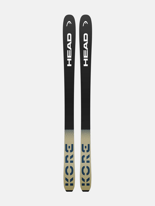 Two black and beige Head skis on a white background