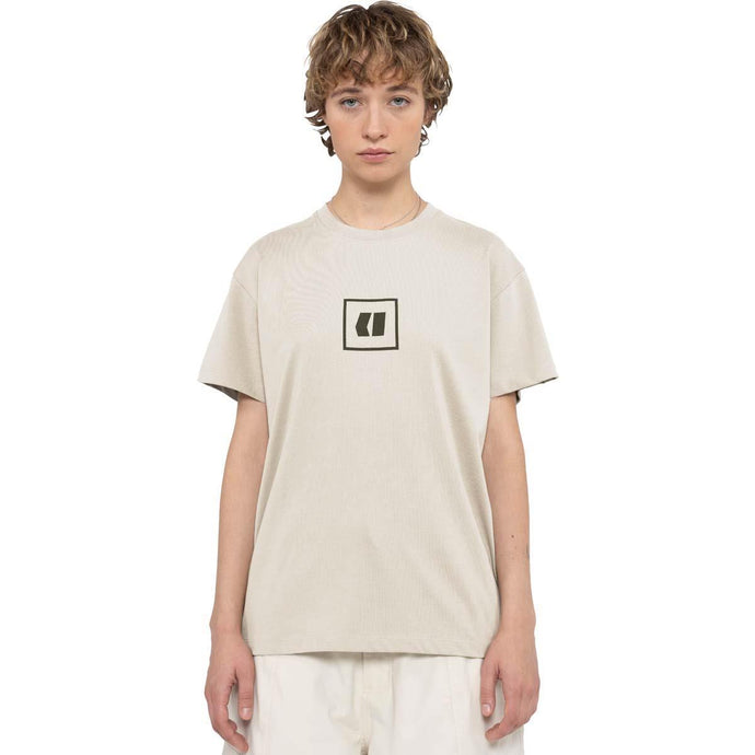 Person wearing a Armada t-shirt with a logo on a white background