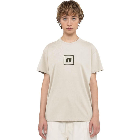 Person wearing a Armada t-shirt with a logo on a white background