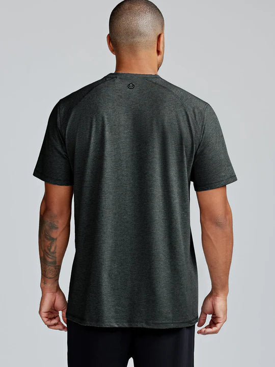 Load image into Gallery viewer, Man wearing a dark gray t-shirt on a plain background
