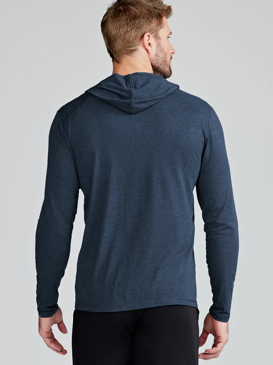Load image into Gallery viewer, Man wearing a blue hoodie from behind on a light gray background
