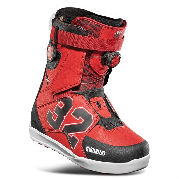 Red and black boot with 'thirtytwo' branding on a white background