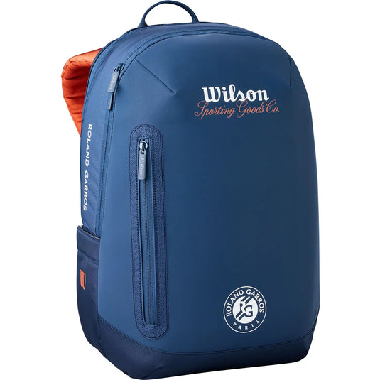 Blue backpack with Wilson and Roland Garros branding on a white background